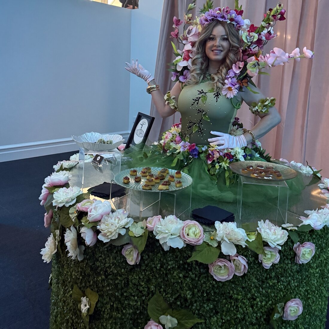 A strolling server adding an interactive food presentation to a private celebration