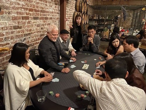 Guests enjoying poker at a 21 Fun casino-themed event