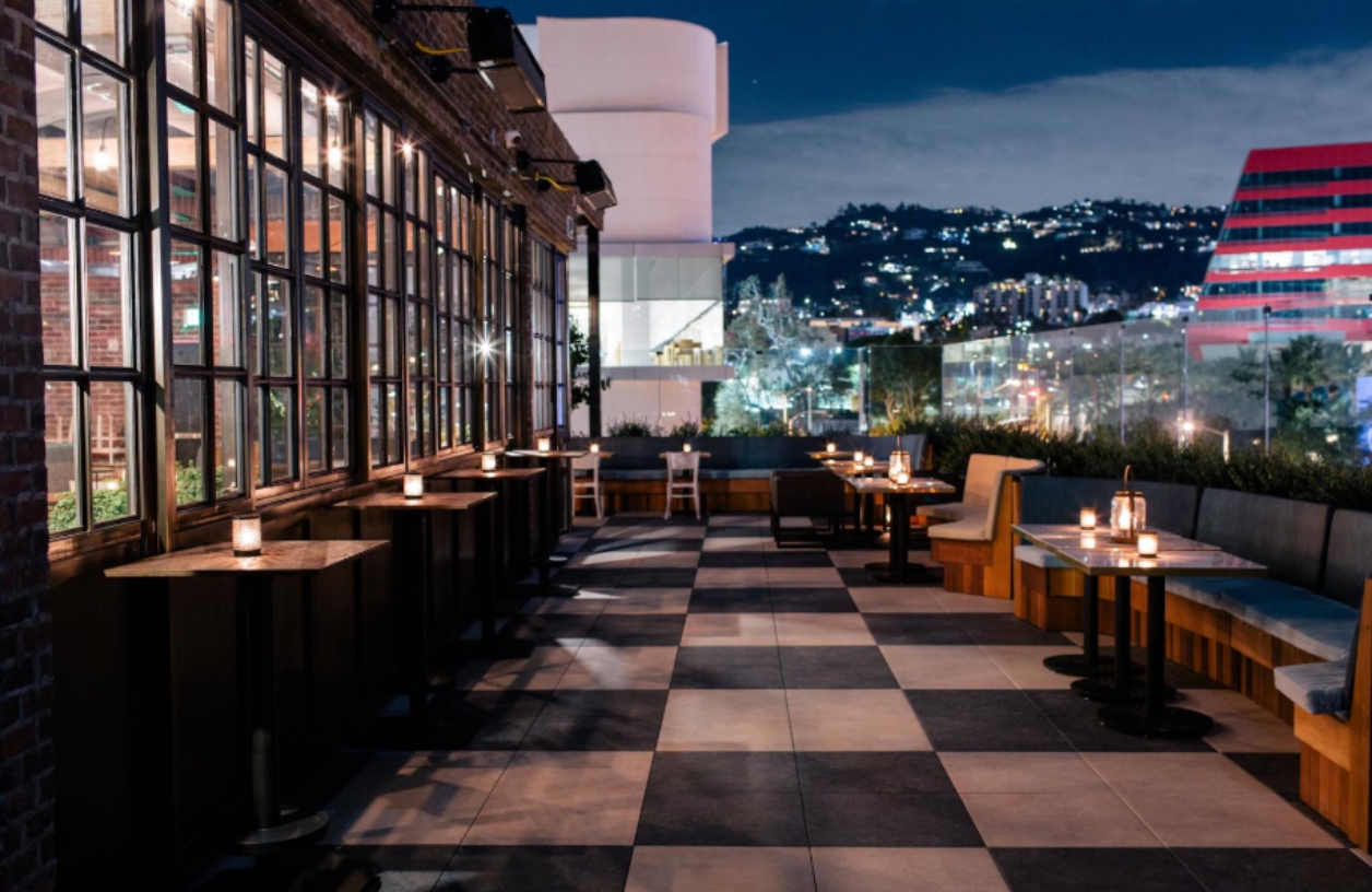 catch la rooftop bar area at night gorgeous view of city skyline