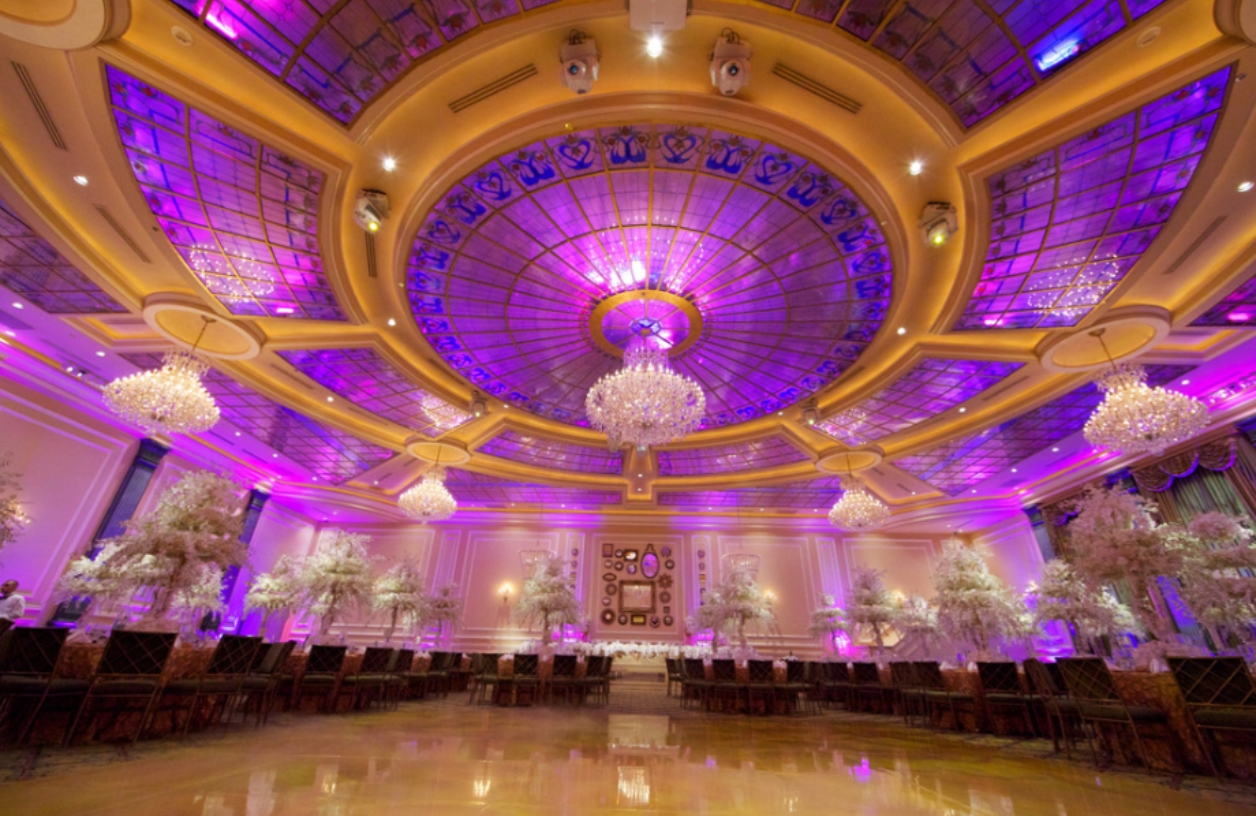 inside the taglyan complex purple crystal ceiling chandeliers mirrors white trees