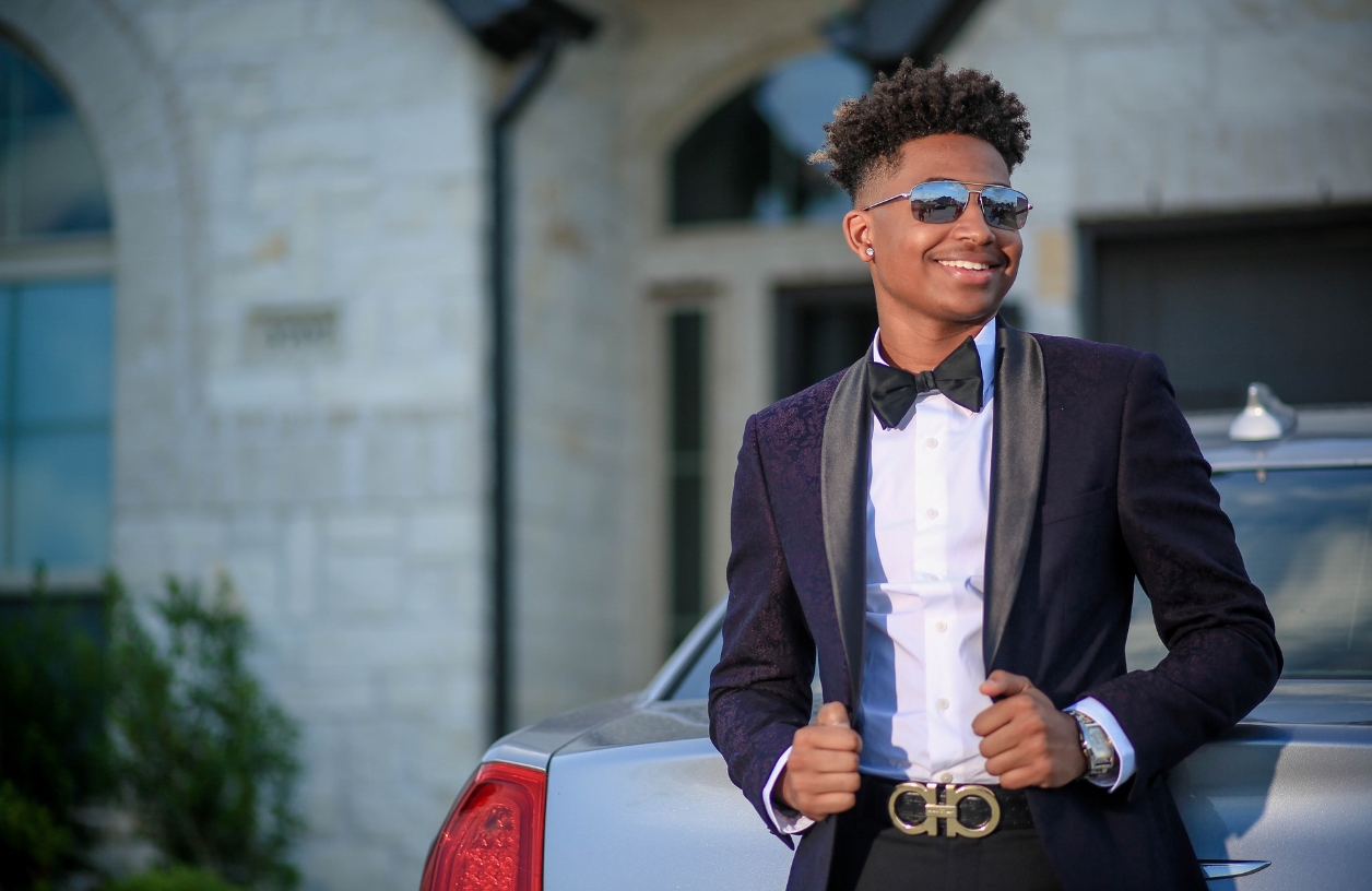 a man dressed in a chic tuxedo for a monte carlo themed casino party