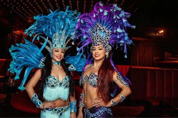 themed performers at a casino party event vegas showgirls carnival dancers mardis gras